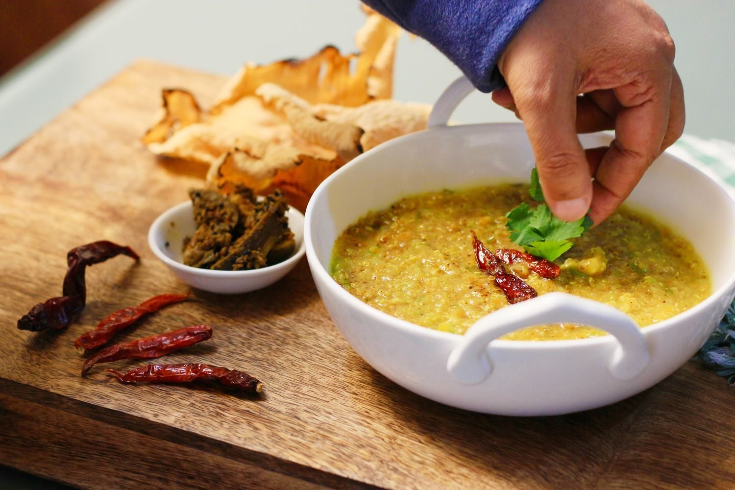 Bowl of soft khichdi with steamed vegetables, a gentle meal for gastritis flare-ups