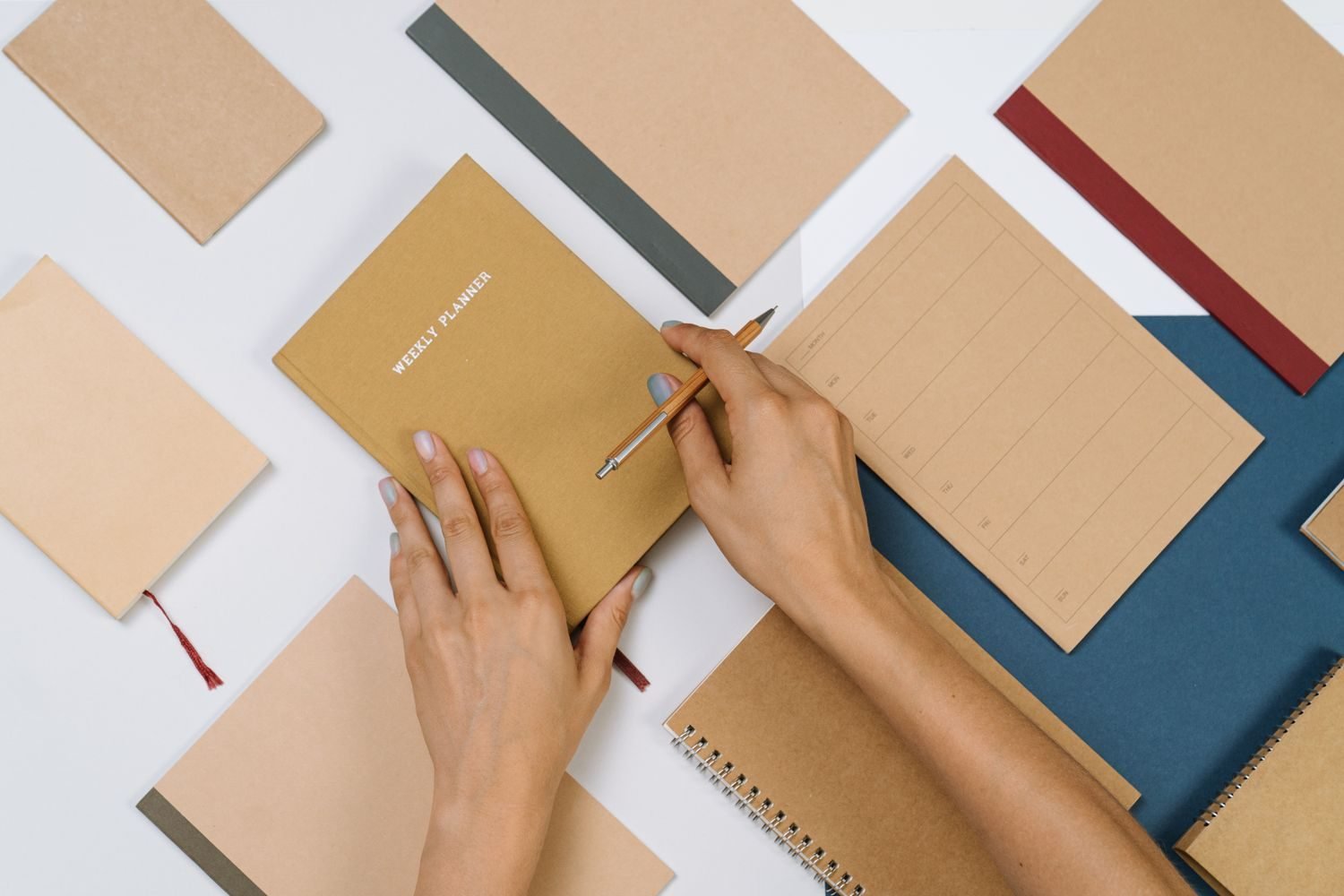 Weekly planner notebook used to map out a training schedule