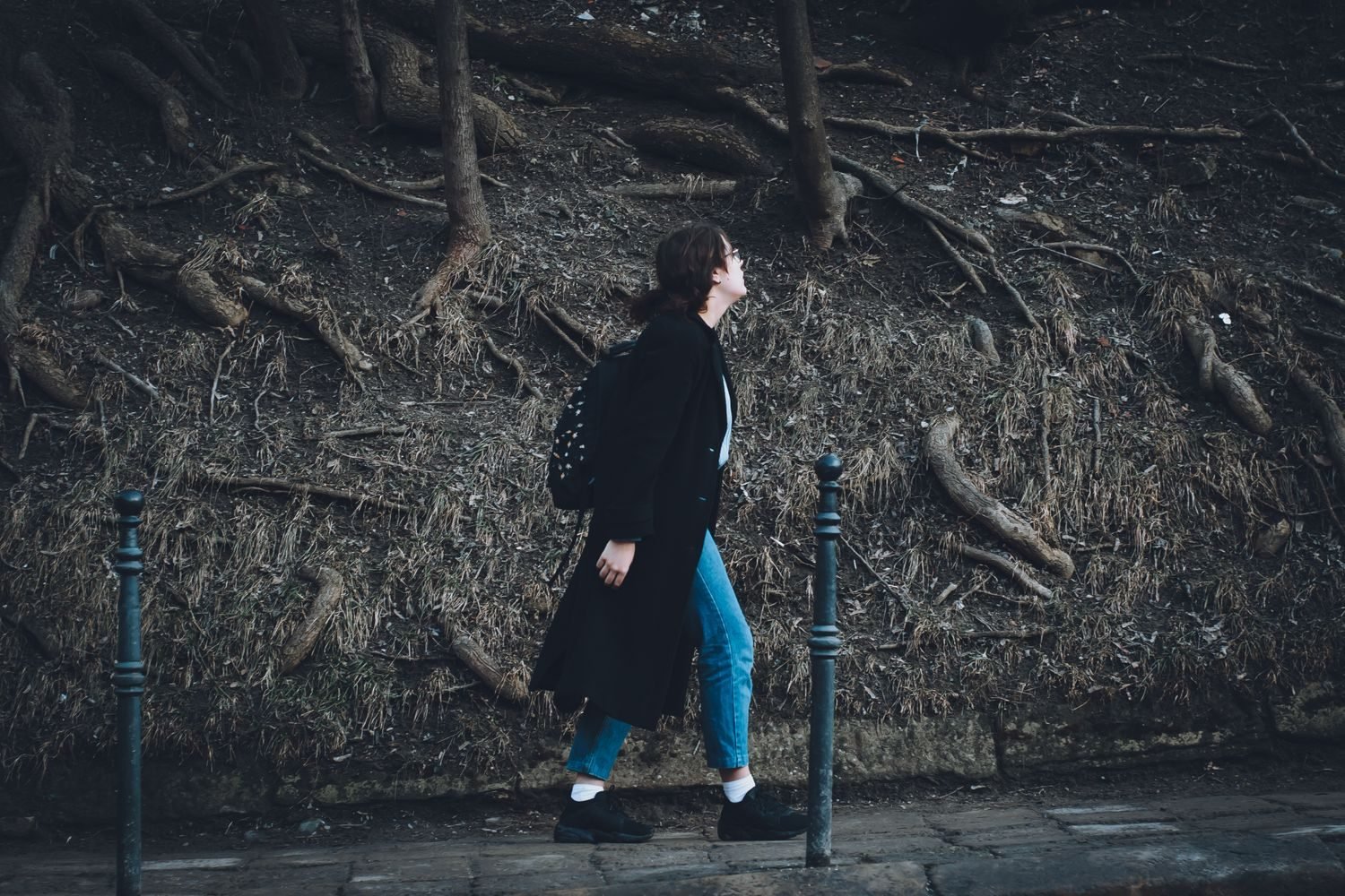 Person walking outdoors as part of active recovery