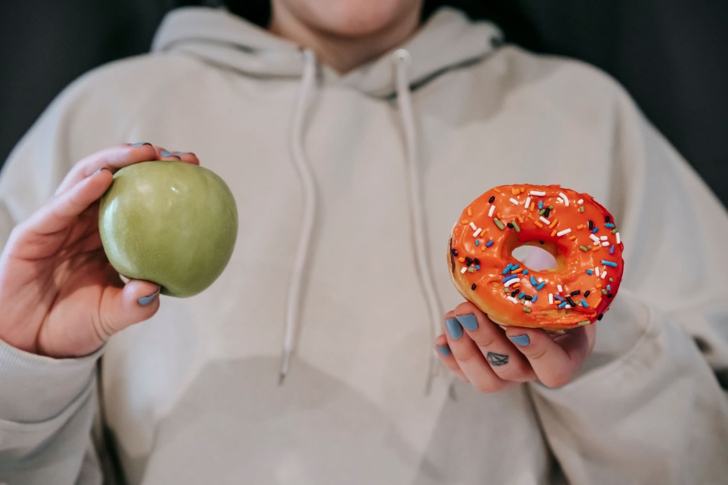 Split comparison image showing processed snack foods and sugary items on one side versus whole anti-inflammatory foods on the other
