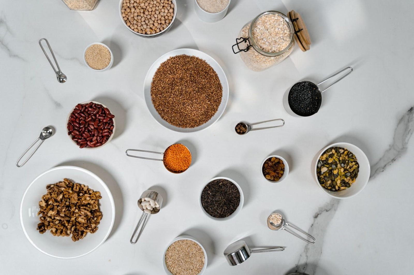 Table-style graphic listing high fiber foods such as lentils, chia seeds, chickpeas, and raspberries with grams of fiber per serving