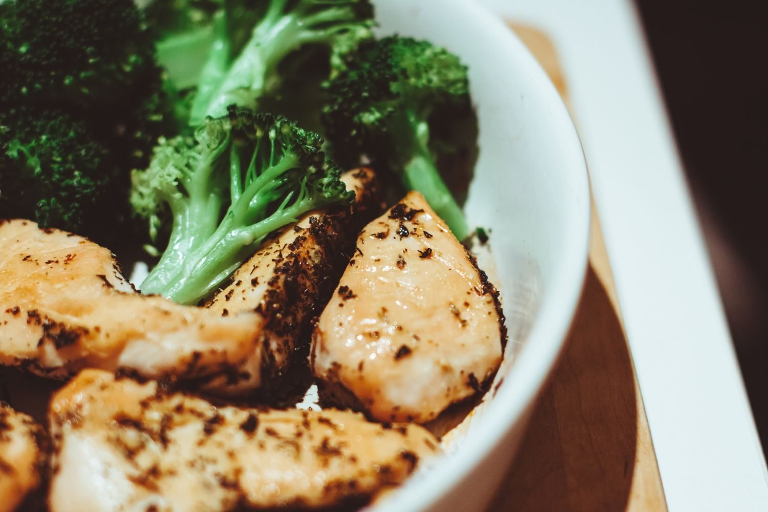 Fresh whole foods including vegetables, herbs, and lean proteins as swaps for high-sodium processed foods