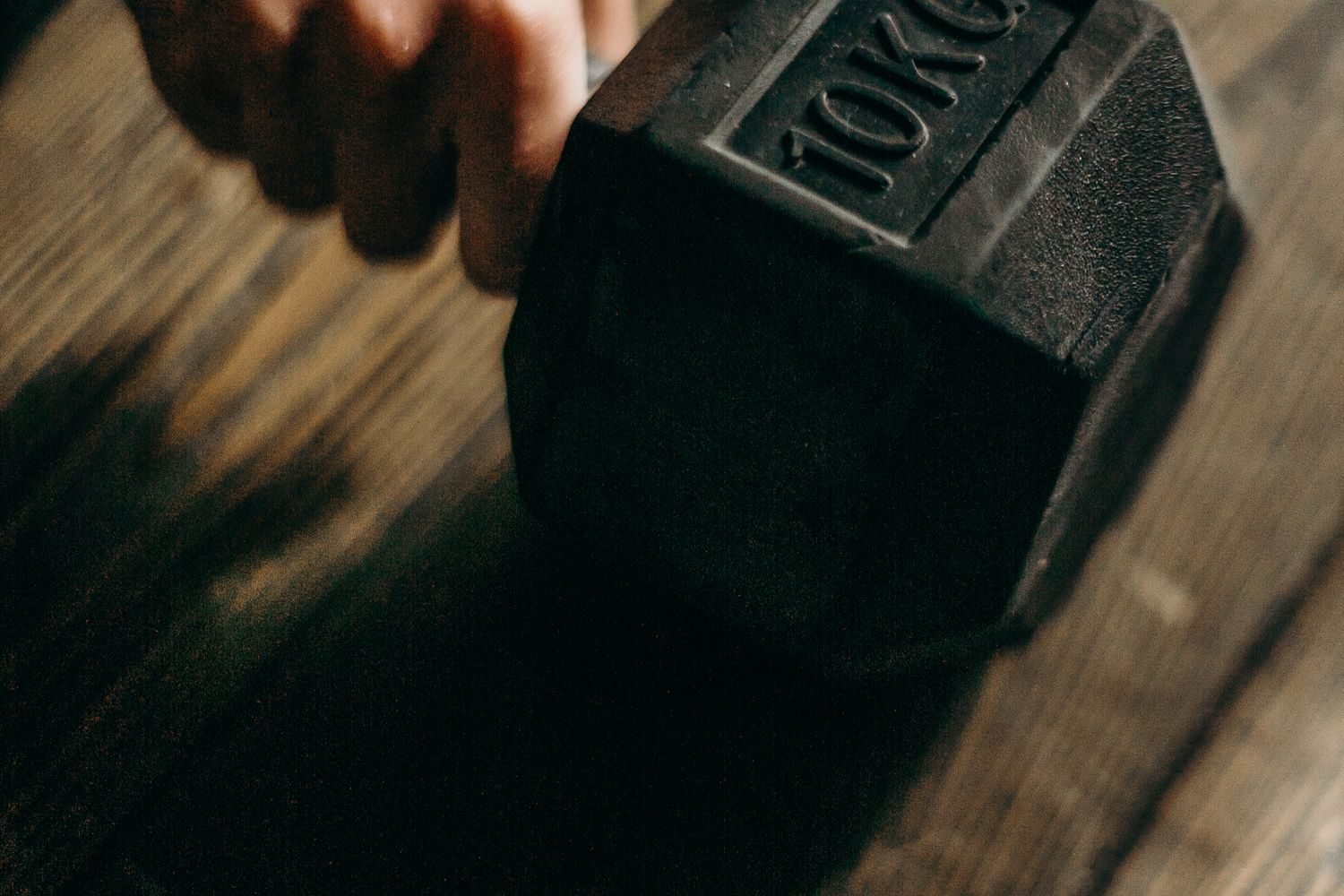 Close-up of a 10kg dumbbell used for a home muscle-building workout