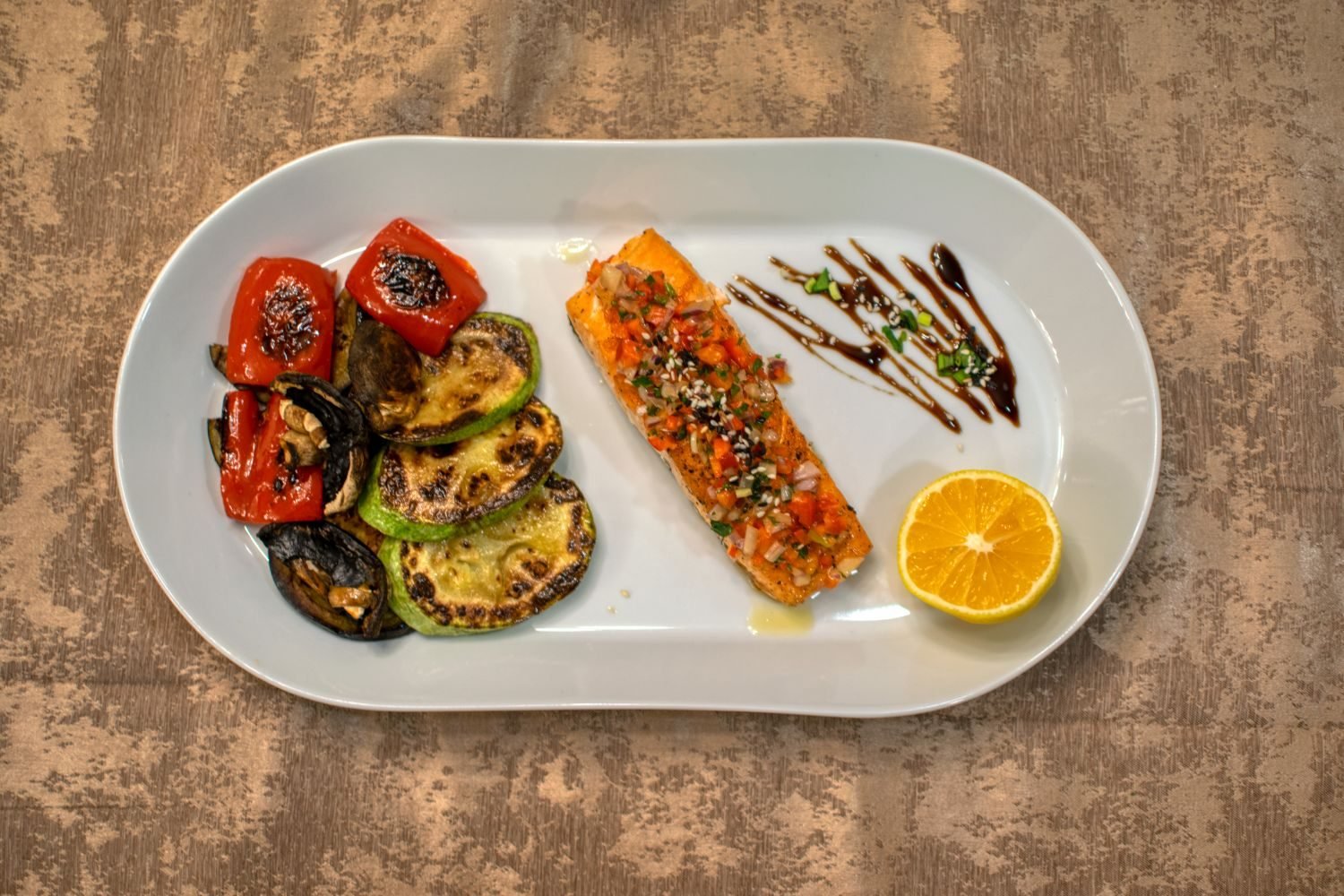 Mediterranean-style anti-inflammatory meal with salmon, olive oil, leafy greens, and whole grains for joint health
