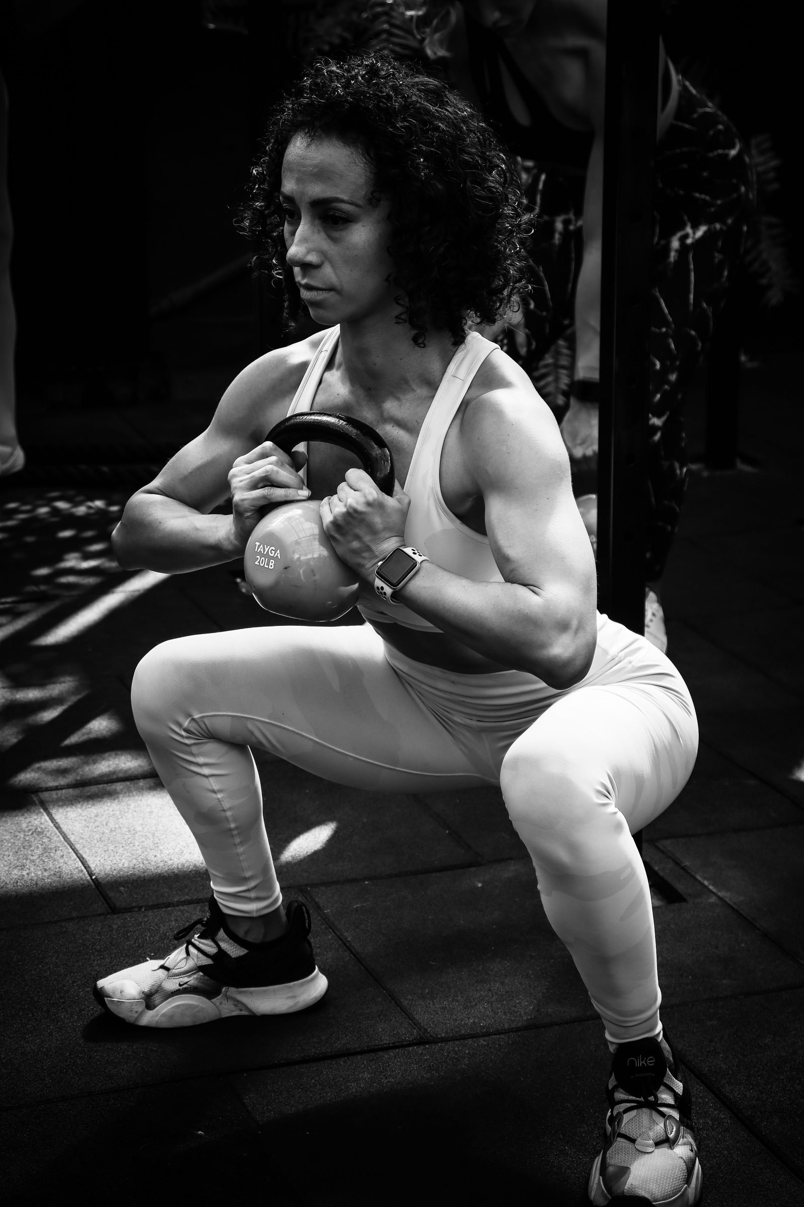 Woman performing a kettlebell goblet squat