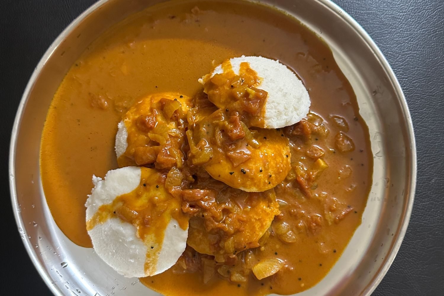 Traditional Indian fermented foods including curd, idli batter, and kanji in bowls