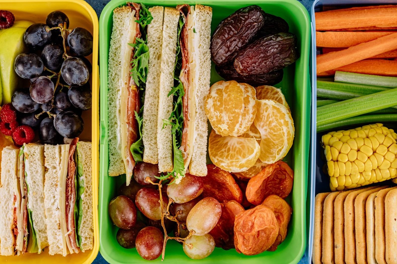Colorful bowl of fruits, vegetables, and whole grains prepared as a balanced meal for a child