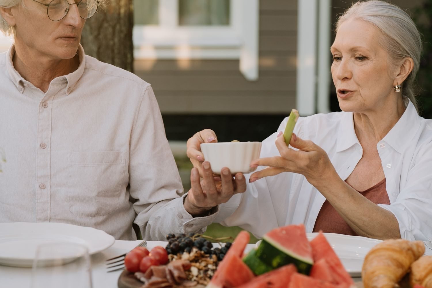 A sample daily meal timeline for an older adult showing breakfast, morning snack, lunch, afternoon snack, and dinner spaced across the day