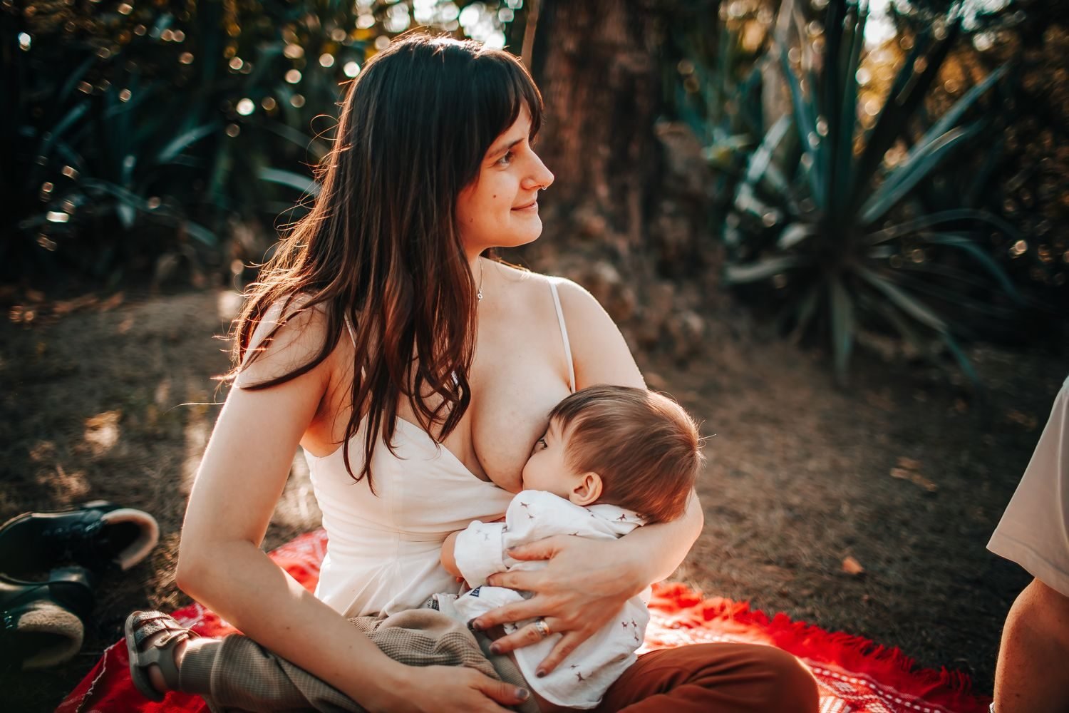 Side-by-side comparison of a pregnant woman and a breastfeeding mother eating balanced meals