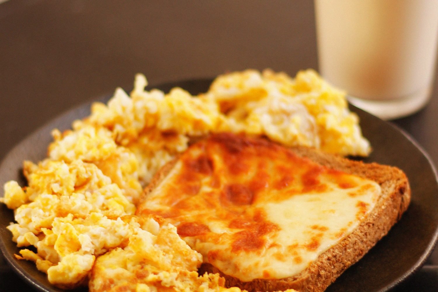 Healthy plate examples showing protein, calcium, and iron-rich foods for a breastfeeding mother