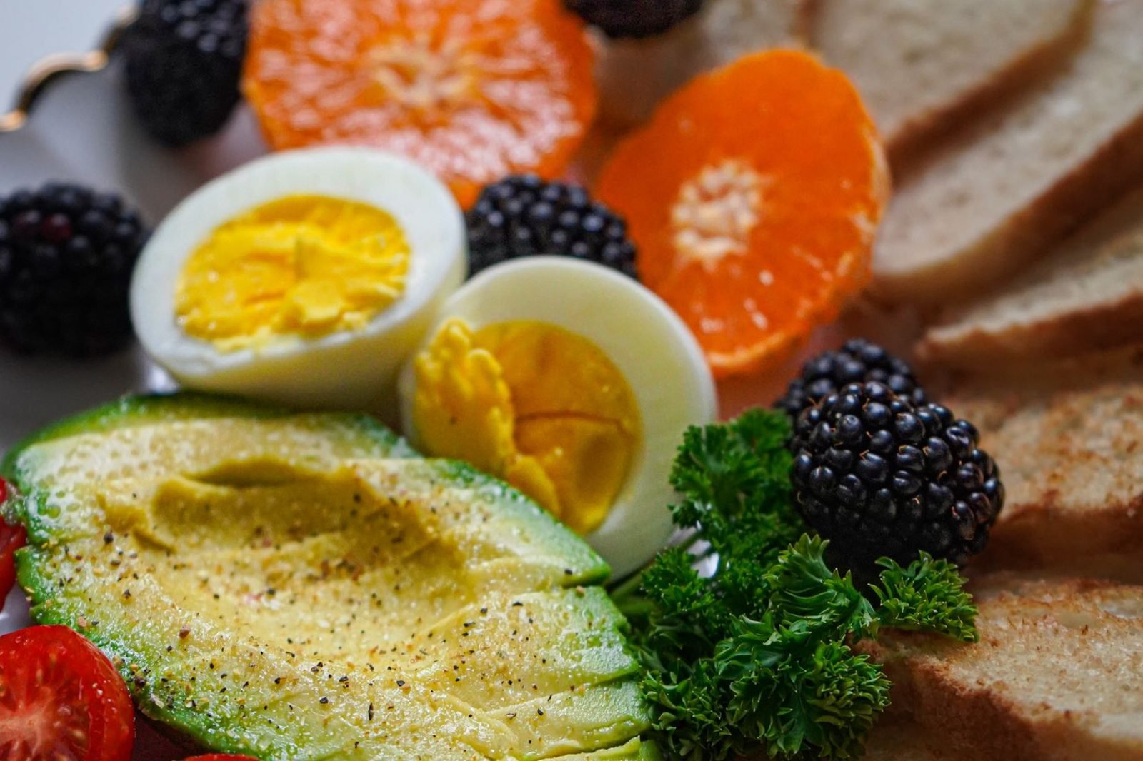 Balanced plate of whole foods representing nutrients best obtained through diet rather than supplements