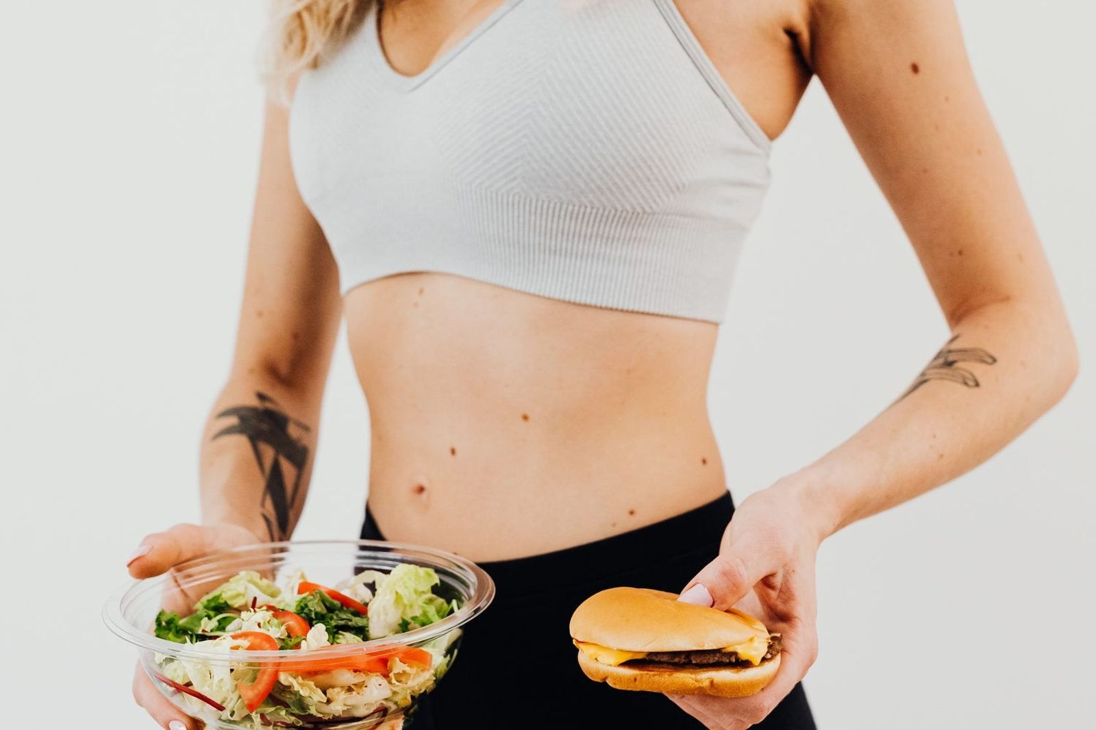 Side-by-side comparison of simple carbohydrate foods like white bread and sugary drinks versus complex carbohydrate foods like oats, lentils, and vegetables