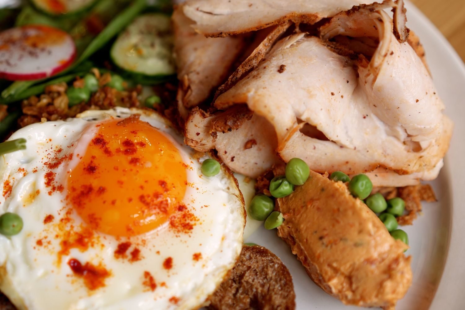 Balanced perimenopause meal plate with lean protein, whole grains, leafy greens, and healthy fats for blood sugar stability
