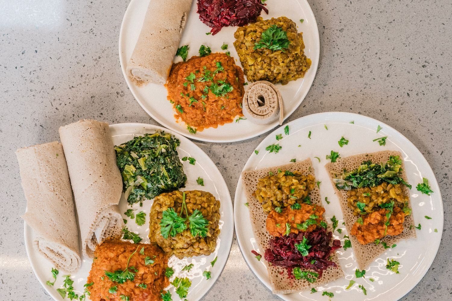 New mother eating a nutrient-dense postpartum meal with lentils, greens, and whole grains