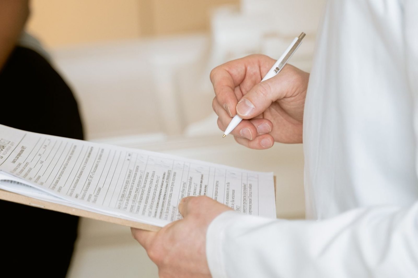 Doctor and patient reviewing kidney function lab results and a personalized nutrition plan