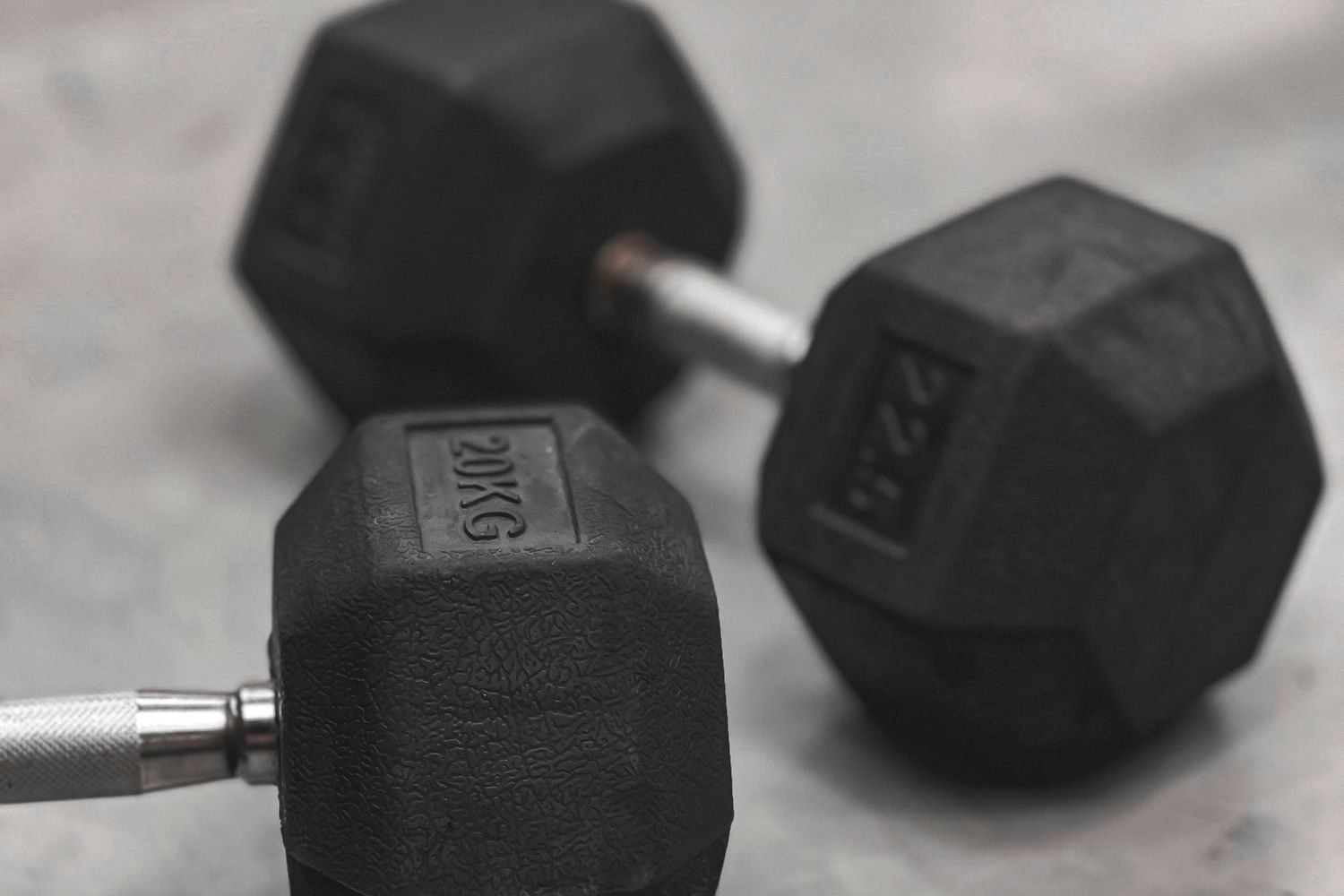 Close-up of a pair of hex dumbbells used for a home shoulder workout