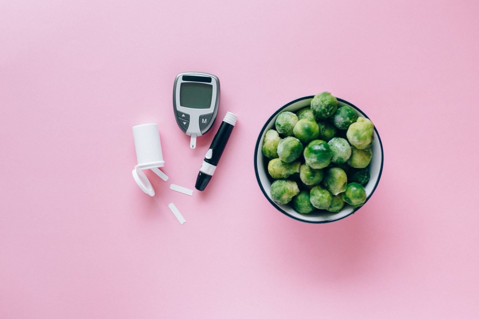 Person choosing between a glass of milk and a low-glycemic meal of vegetables and whole grains, illustrating diet choices linked to acne research