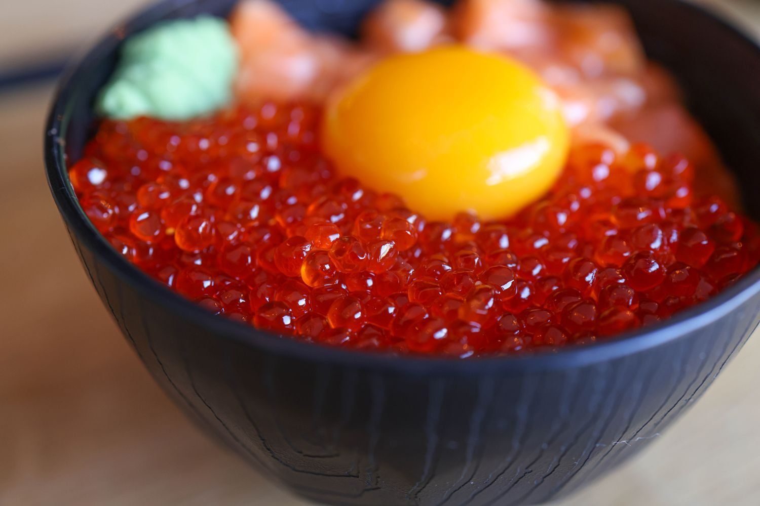 Iodine-rich foods including seaweed, iodized salt, eggs, and seafood arranged on a table