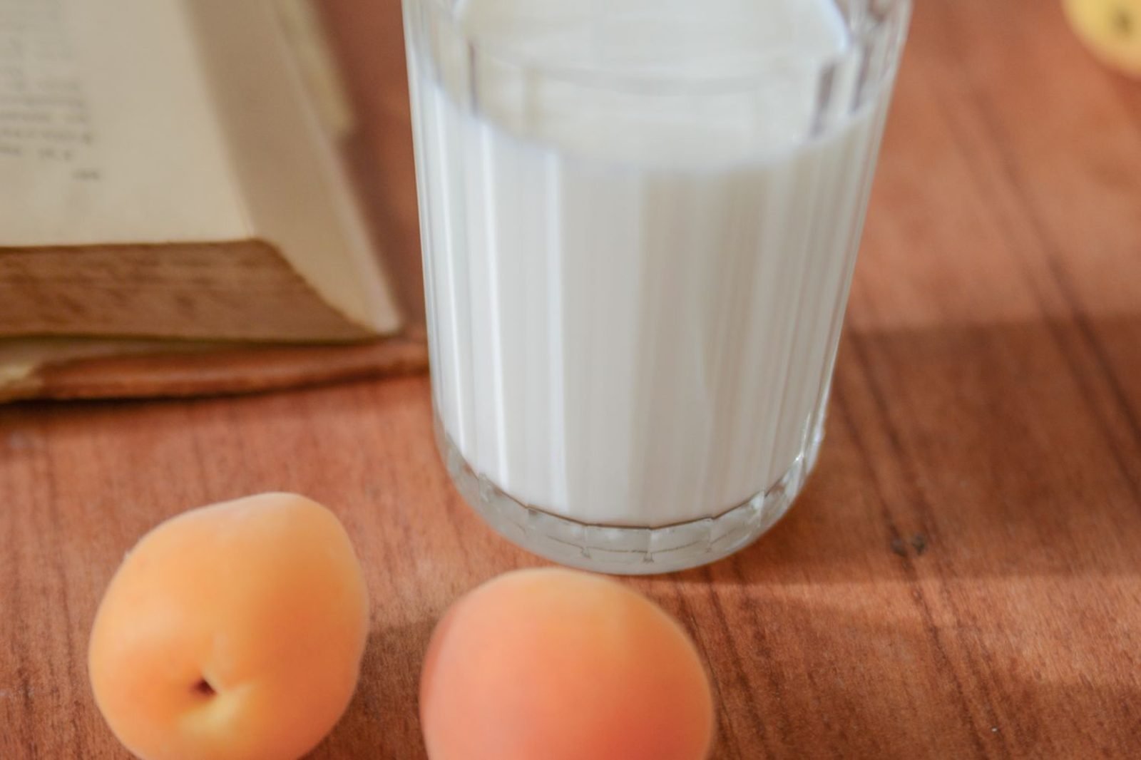 Calcium-rich foods for women's bone health including dairy, leafy greens, and fortified plant milk