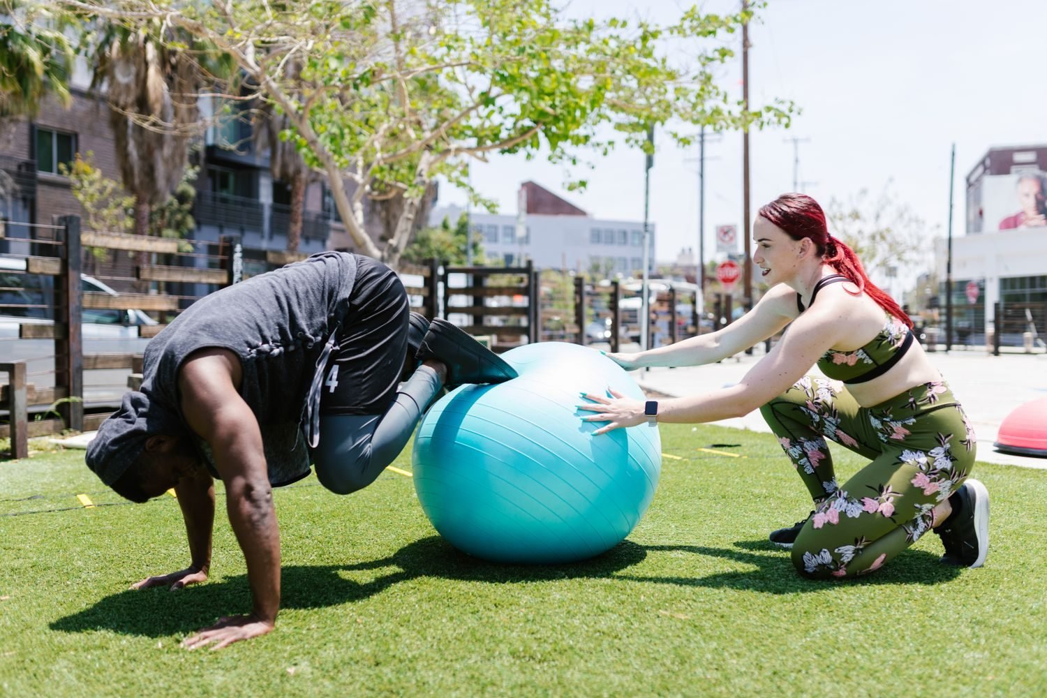 Group outdoor bootcamp-style fitness training session