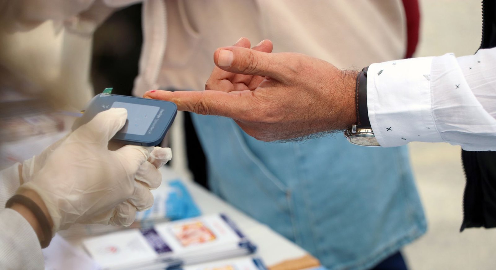 Glucometer used for blood sugar testing to diagnose diabetes behind unexplained weight loss