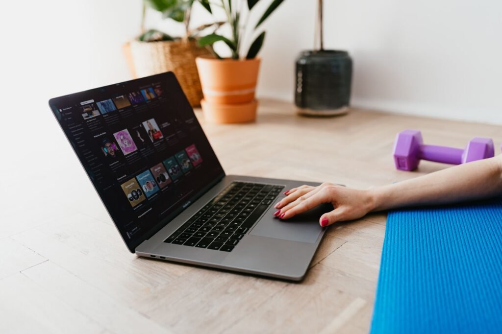 Joining a live online Zumba class from a laptop at home