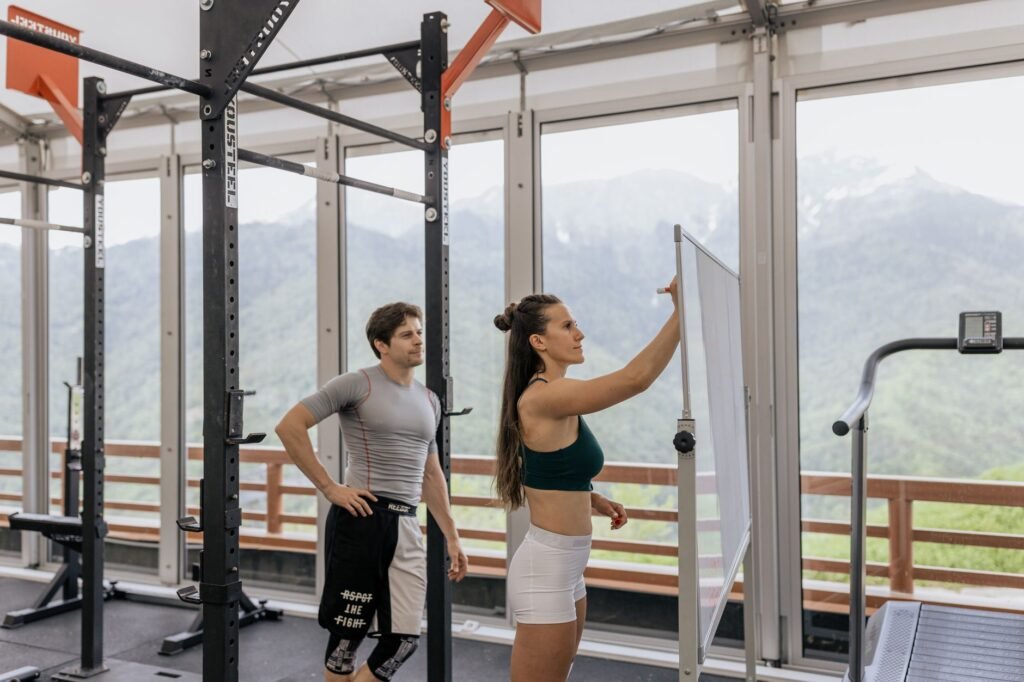 Coach building a personalized weight loss program for an individual client