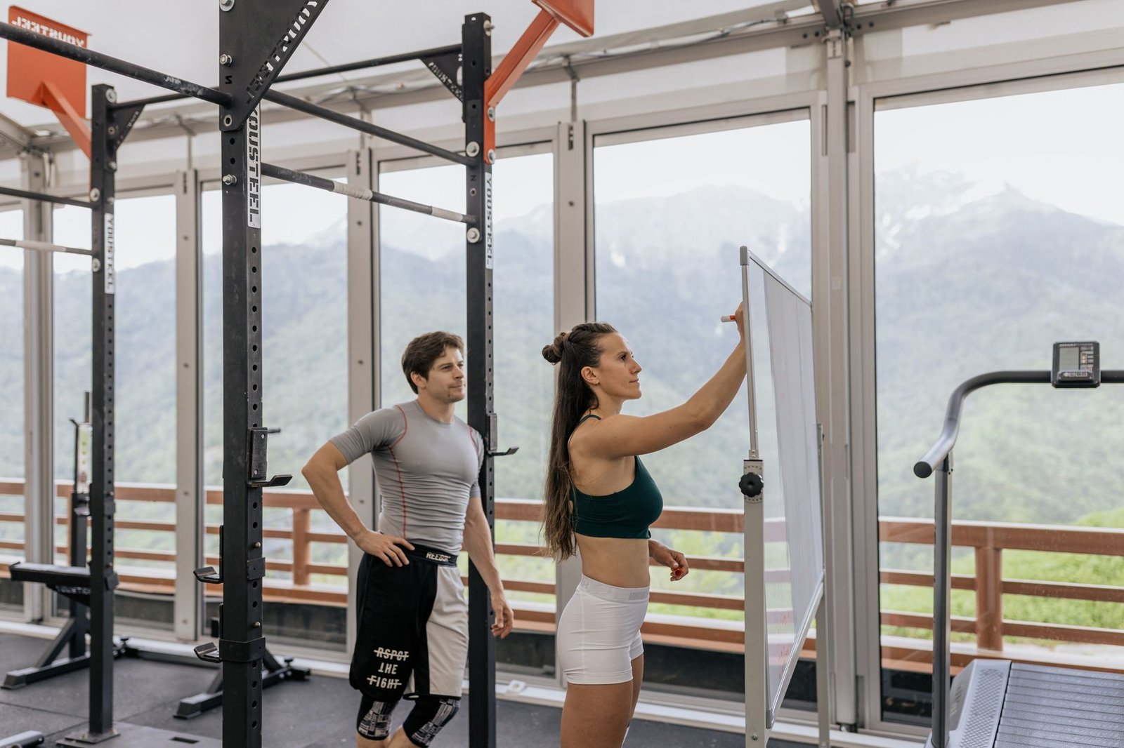 Coach building a personalized weight loss program for an individual client
